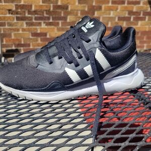 Adidas boy sneakers black with white stripes size 3.5